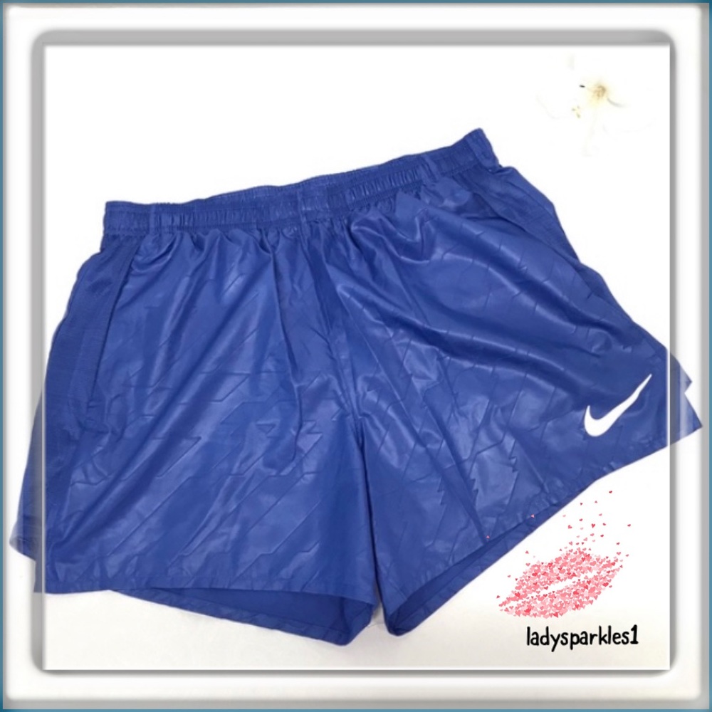 Nike | Blue Textured Shorts with pockets.  Size Large